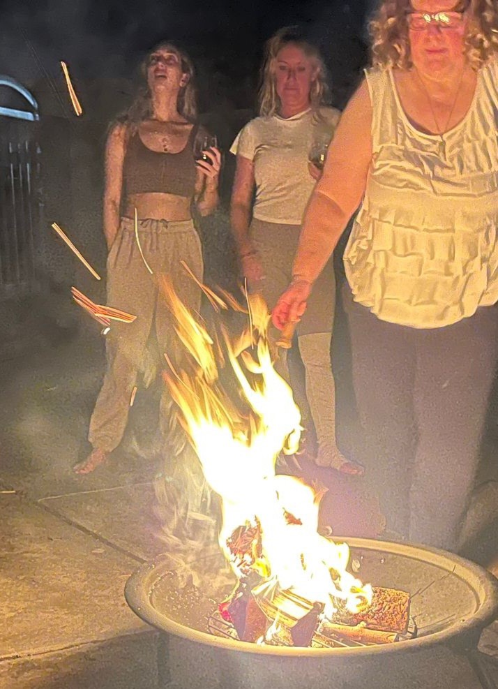 Carol tending fire at Palm Springs retreat